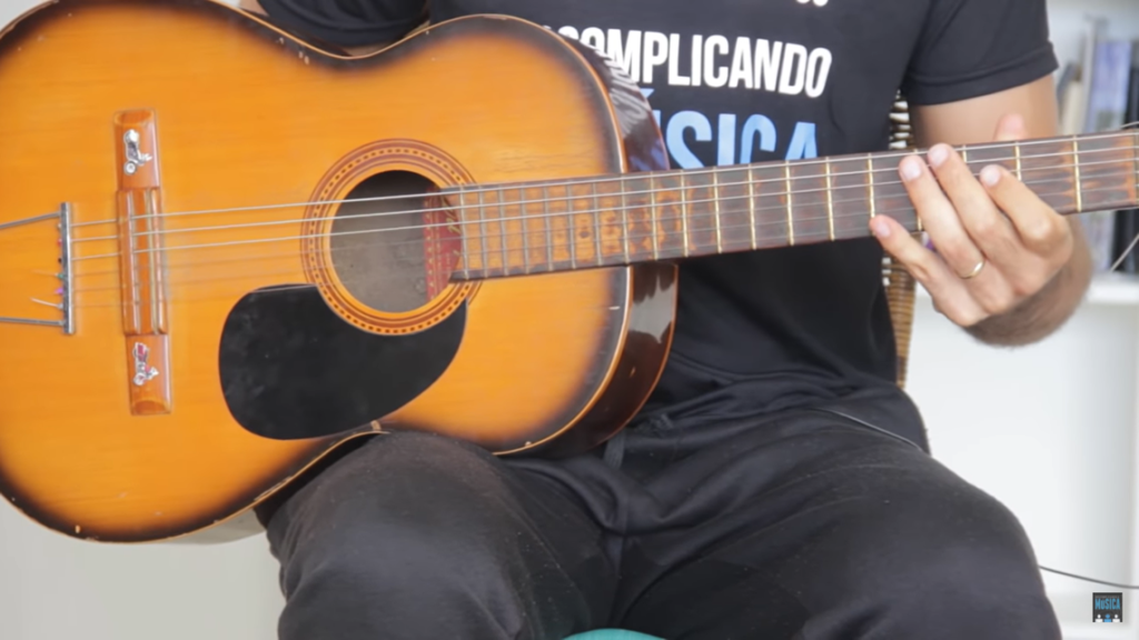 guitar on the right leg